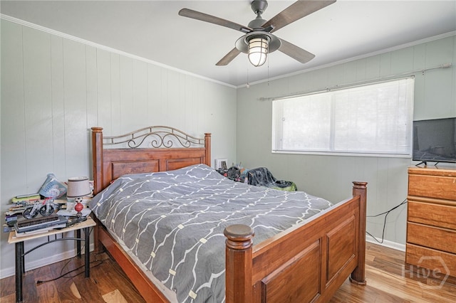 124 Drennon Dr, Jesup, GA 31545 - bedroom with wood finished floors, crown molding, and a ceiling fan