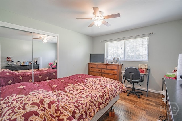 124 Drennon Dr, Jesup, GA 31545 - bedroom with hardwood / wood-style floors, a closet, and a ceiling fan