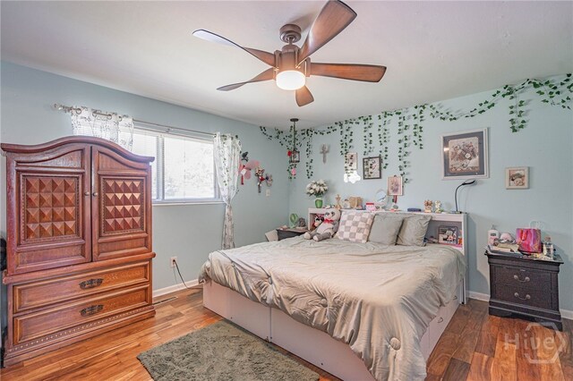 124 Drennon Dr, Jesup, GA 31545 - bedroom with wood finished floors and ceiling fan