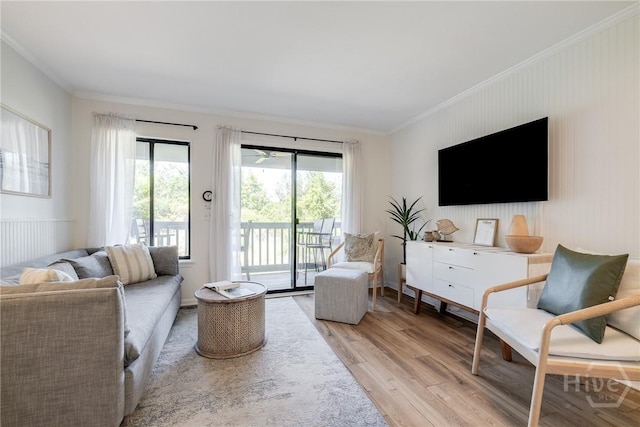 1217 Bay St Unit 109B, Tybee Island, GA 31328 - living area featuring plenty of natural light, light wood-style flooring, and crown molding