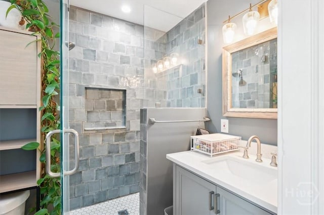308 E 55th St, Savannah, GA 31405 - full bathroom with a shower stall, vanity, and tile patterned flooring
