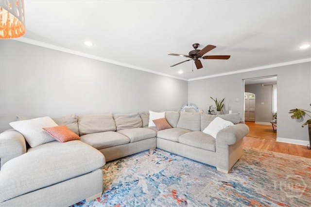 308 E 55th St, Savannah, GA 31405 - living area featuring a ceiling fan, wood finished floors, recessed lighting, and ornamental molding