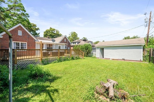 308 E 55th St, Savannah, GA 31405 - view of grassy yard featuring a deck and an outdoor structure