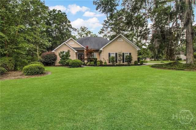 17 Hickory Grove Pt, Savannah, GA 31405 - view of front of home with stucco siding and a front lawn