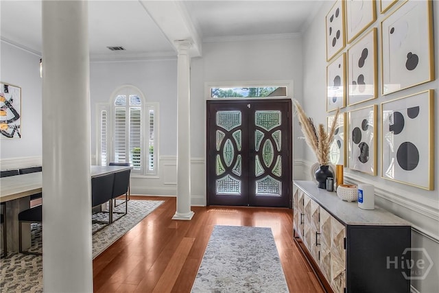 17 Hickory Grove Pt, Savannah, GA 31405 - entryway with decorative columns, plenty of natural light, wood finished floors, ornamental molding, and french doors