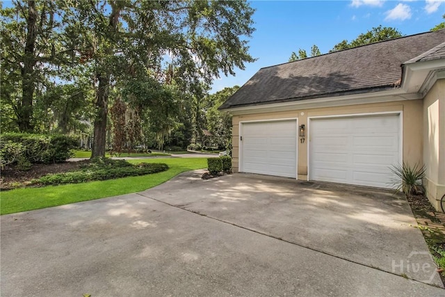 17 Hickory Grove Pt, Savannah, GA 31405 - garage featuring concrete driveway
