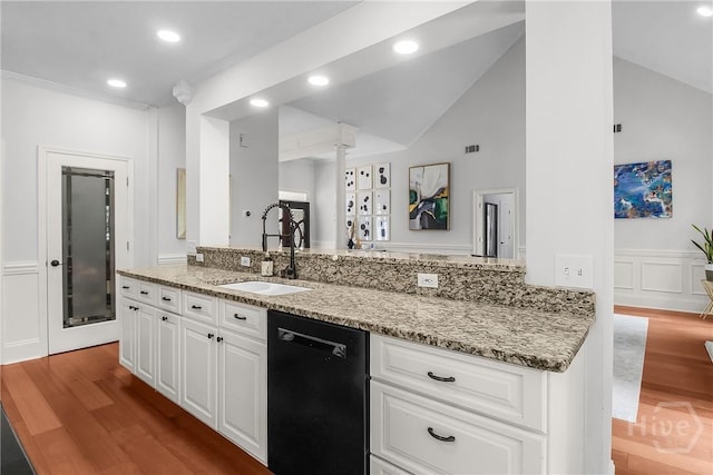 17 Hickory Grove Pt, Savannah, GA 31405 - kitchen with dishwasher, light stone counters, vaulted ceiling, wood finished floors, and recessed lighting