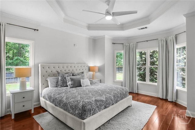 17 Hickory Grove Pt, Savannah, GA 31405 - bedroom with a tray ceiling, multiple windows, hardwood / wood-style flooring, crown molding, and a ceiling fan