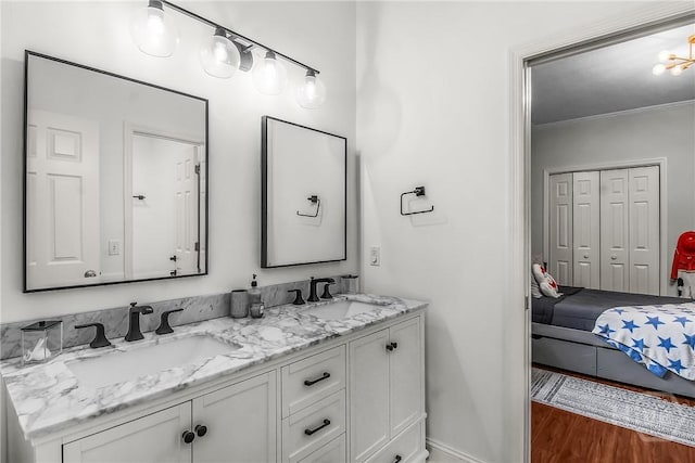 17 Hickory Grove Pt, Savannah, GA 31405 - bathroom featuring double vanity, wood finished floors, and ornamental molding
