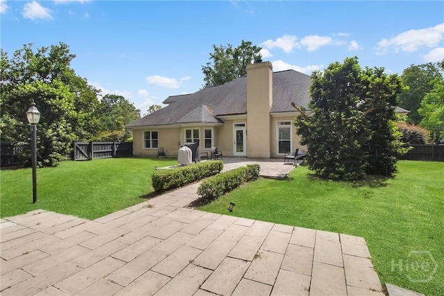 17 Hickory Grove Pt, Savannah, GA 31405 - rear view of property with a patio area, a chimney, and stucco siding