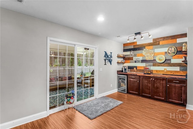 161 Laurel Ln, Guyton, GA 31312 - indoor bar with wine cooler and light wood-style flooring