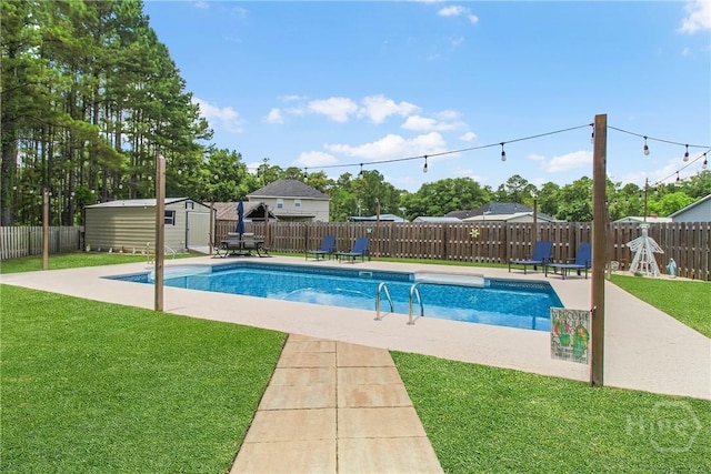 161 Laurel Ln, Guyton, GA 31312 - view of swimming pool with a shed, a fenced backyard, and a patio