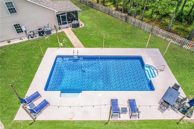 161 Laurel Ln, Guyton, GA 31312 - view of swimming pool featuring a sunroom and a fenced backyard