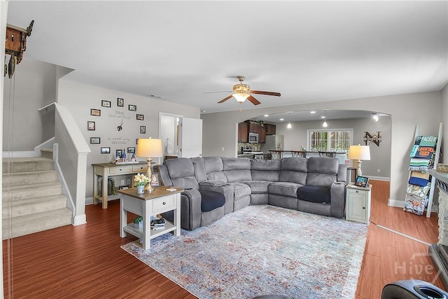 161 Laurel Ln, Guyton, GA 31312 - living area featuring ceiling fan, stairs, and wood finished floors