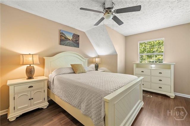 310 Mapmaker Ln, Savannah, GA 31410 - bedroom featuring dark wood-style floors, a textured ceiling, a ceiling fan, and lofted ceiling
