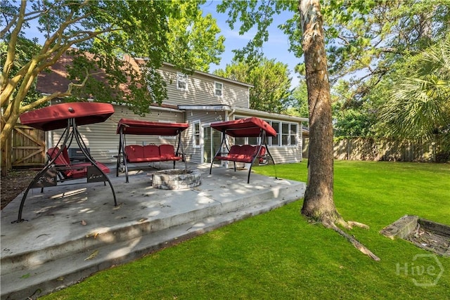 310 Mapmaker Ln, Savannah, GA 31410 - view of yard with a patio and an outdoor fire pit