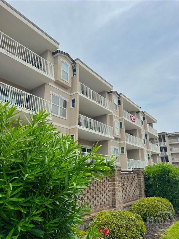 404 Butler Ave Unit 612, Tybee Island, GA 31328 - view of apartment building / complex
