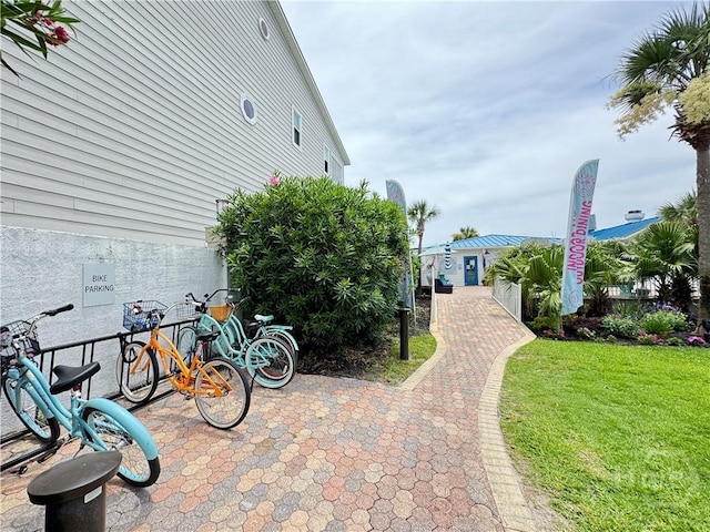 404 Butler Ave Unit 612, Tybee Island, GA 31328 - view of home's exterior featuring a yard