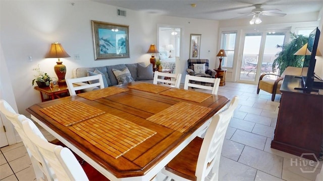 1609 Strand Ave Unit 306, Tybee Island, GA 31328 - dining room featuring ceiling fan and light tile patterned floors