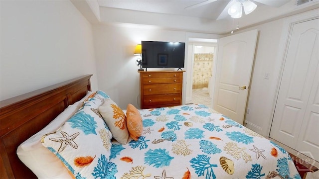1609 Strand Ave Unit 306, Tybee Island, GA 31328 - bedroom with a ceiling fan and ensuite bathroom