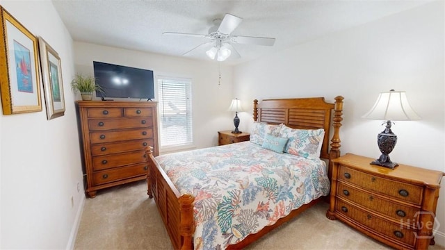 1609 Strand Ave Unit 306, Tybee Island, GA 31328 - bedroom featuring light carpet and ceiling fan