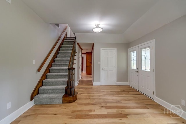 611 Benton Dr, Pooler, GA 31322 - foyer entrance with stairs and light wood-style floors