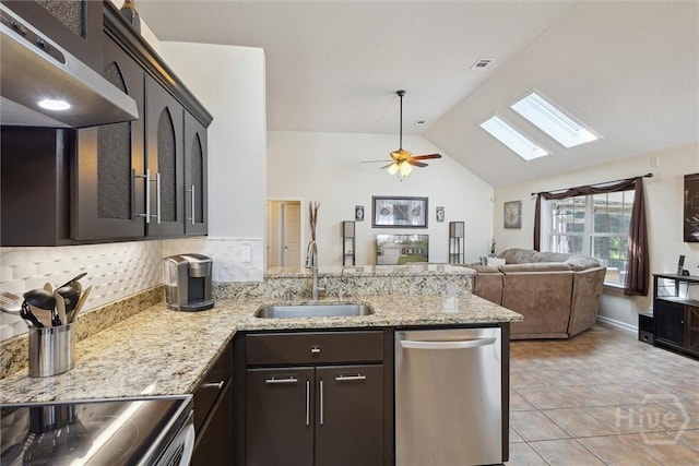 226 Silver Brook Cir, Pooler, GA 31322 - kitchen featuring range hood, stainless steel dishwasher, a peninsula, a skylight, and lofted ceiling