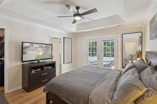 226 Silver Brook Cir, Pooler, GA 31322 - bedroom featuring french doors, access to exterior, a textured ceiling, light wood finished floors, and ornamental molding