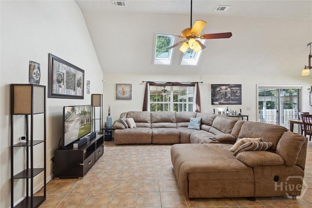 226 Silver Brook Cir, Pooler, GA 31322 - living room featuring a skylight, ceiling fan, healthy amount of natural light, high vaulted ceiling, and light tile patterned floors