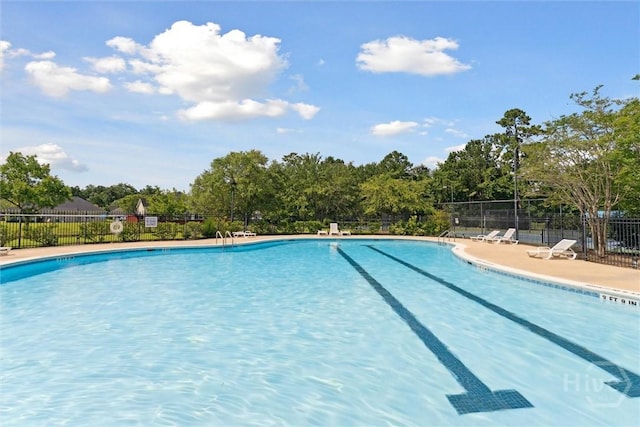 7 River Rock Rd, Savannah, GA 31419 - community pool featuring view of wooded area