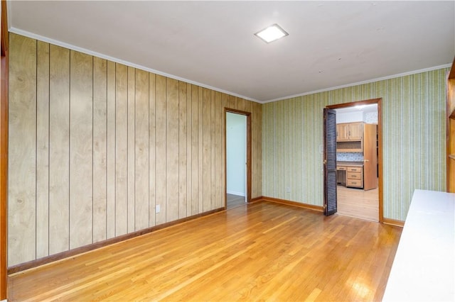 401 E Smith St, Claxton, GA 30417 - spare room featuring wood finished floors and ornamental molding