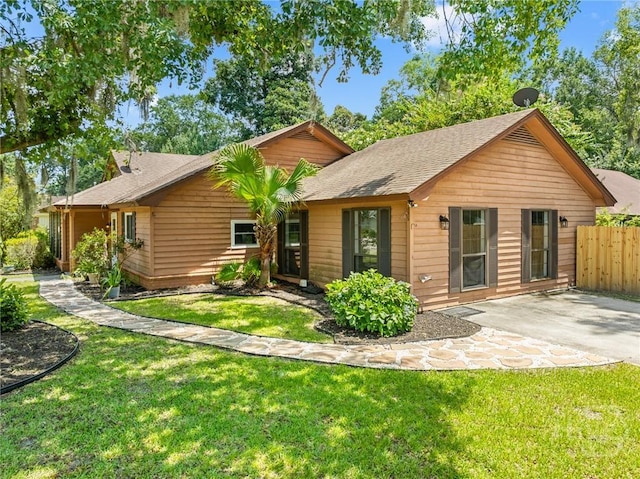 2 Brandle Cv, Savannah, GA 31405 - view of front of home featuring a shingled roof and a patio area