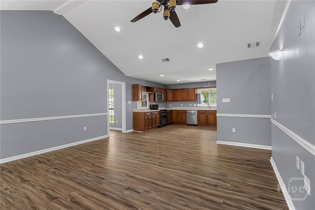 2 Brandle Cv, Savannah, GA 31405 - kitchen featuring appliances with stainless steel finishes, a ceiling fan, light countertops, dark wood-type flooring, and open floor plan