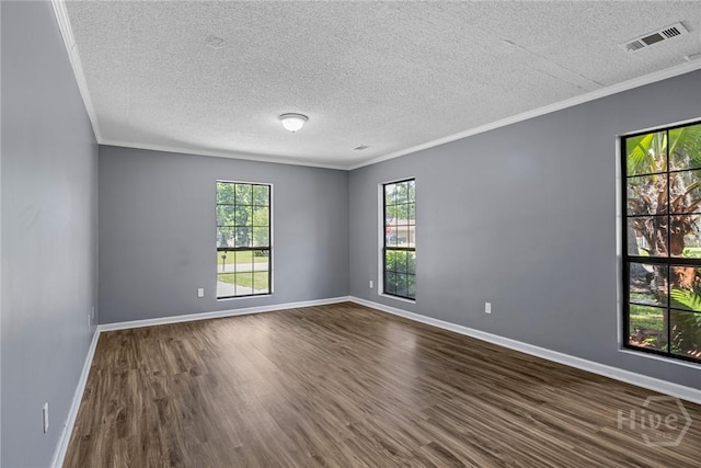 2 Brandle Cv, Savannah, GA 31405 - empty room with dark wood finished floors, a textured ceiling, and crown molding