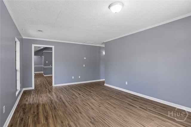 2 Brandle Cv, Savannah, GA 31405 - unfurnished room with a textured ceiling, dark wood-style floors, and crown molding