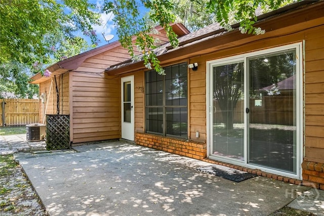 2 Brandle Cv, Savannah, GA 31405 - rear view of house featuring a patio