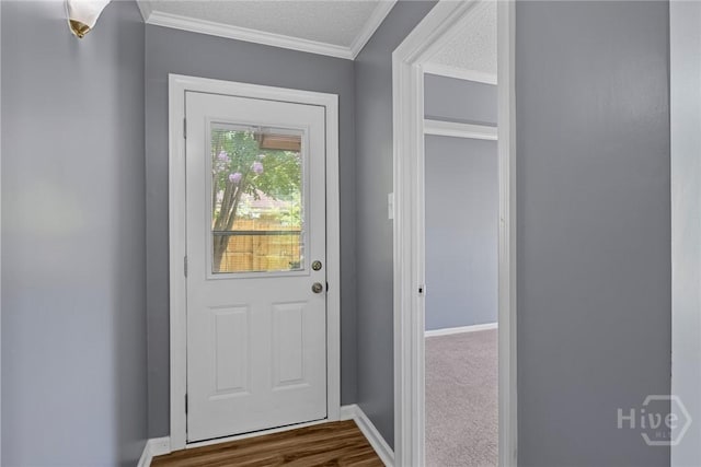 2 Brandle Cv, Savannah, GA 31405 - entryway featuring ornamental molding, a textured ceiling, and dark wood-style flooring