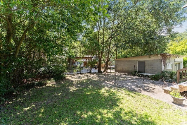 1405 E 51st St, Savannah, GA 31404 - view of grassy yard with a patio area