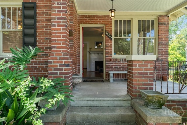 1405 E 51st St, Savannah, GA 31404 - doorway to property with a porch and brick siding