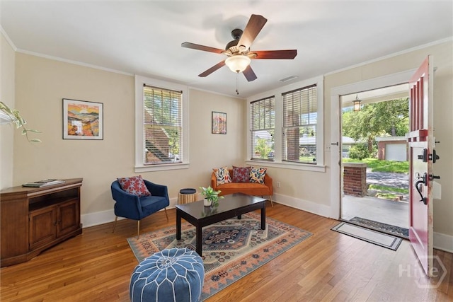 1405 E 51st St, Savannah, GA 31404 - sitting room featuring light wood-style flooring, healthy amount of natural light, crown molding, and a ceiling fan