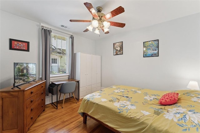 1405 E 51st St, Savannah, GA 31404 - bedroom with light wood-style floors and a ceiling fan