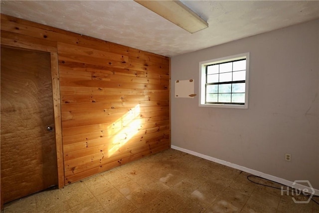 111 Oaklawn Dr, Rincon, GA 31326 - unfurnished room with light floors and wood walls