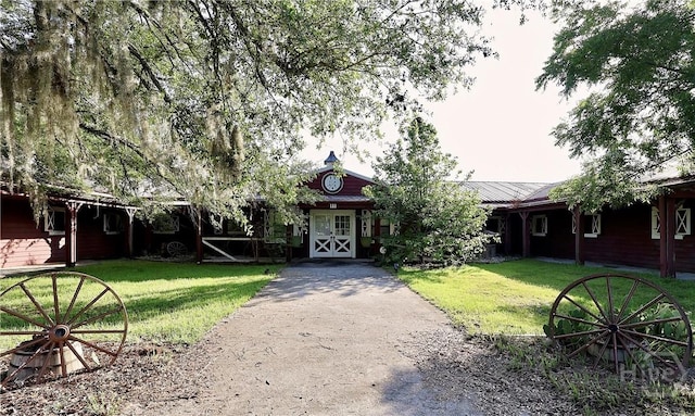 111 Oaklawn Dr, Rincon, GA 31326 - view of front of property featuring a front yard and a metal roof
