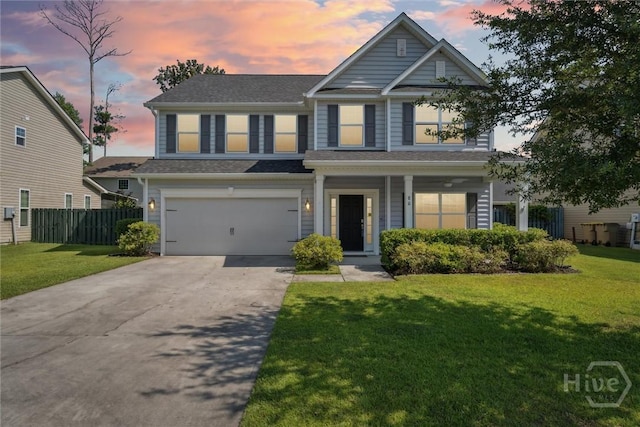 80 Glen Way, Richmond Hill, GA 31324 - view of front of home with concrete driveway, an attached garage, a shingled roof, and a porch
