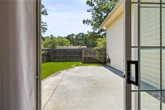 135 Trellis Way, Savannah, GA 31419 - fenced backyard featuring a patio area