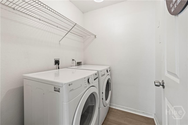 135 Trellis Way, Savannah, GA 31419 - laundry room with independent washer and dryer and dark wood-type flooring