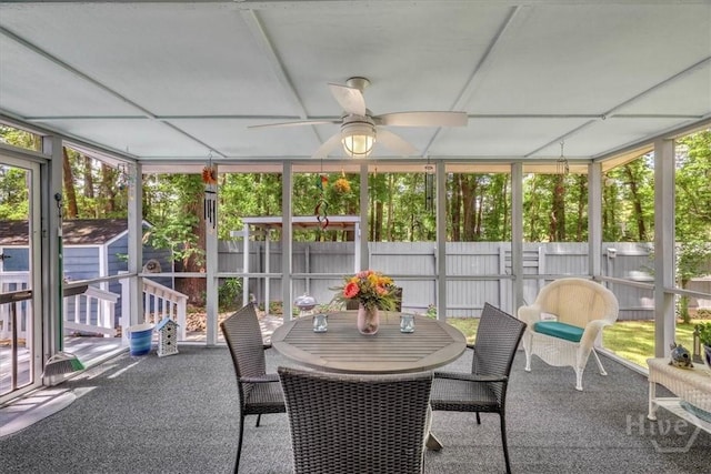 13 Bryan Wood Cir, Savannah, GA 31410 - sunroom with ceiling fan, plenty of natural light, and outdoor dining area