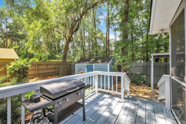 13 Bryan Wood Cir, Savannah, GA 31410 - deck featuring a fenced backyard, grilling area, and a storage unit