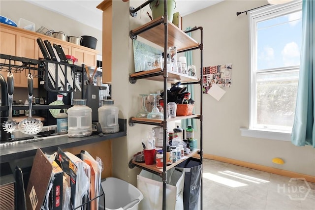 106 W Gwinnett St Unit 4D, Savannah, GA 31401 - bar with plenty of natural light and tile patterned floors