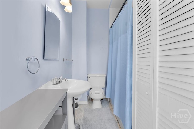 106 W Gwinnett St Unit 4D, Savannah, GA 31401 - bathroom featuring a closet and tile patterned floors